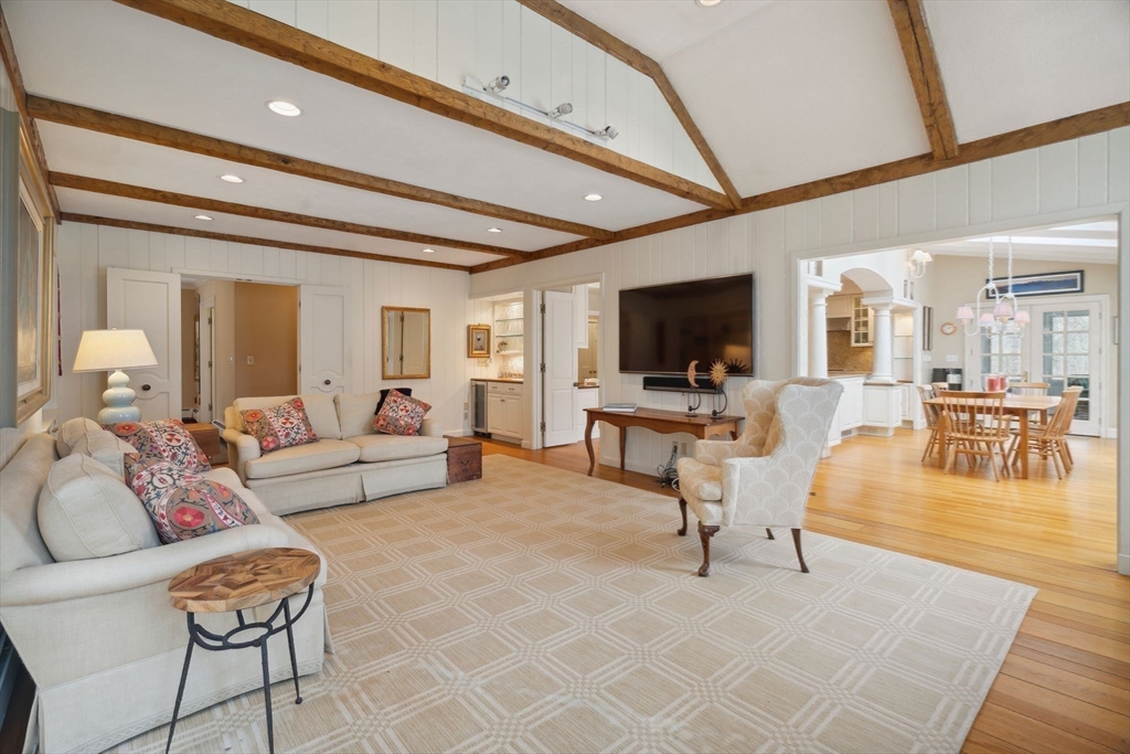 24 Wheeler Road Lincoln, MA 01773 - Photo 10 of 32 a living room with furniture and a flat screen tv