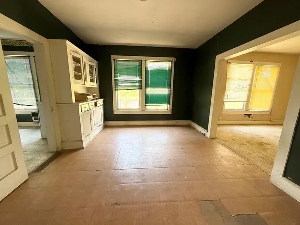 an empty room with windows