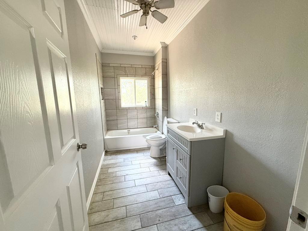 105a Riesel Tx 76682 Riesel, TX 76682 - Photo 15 of 34 a bathroom with a sink mirror vanity and toilet