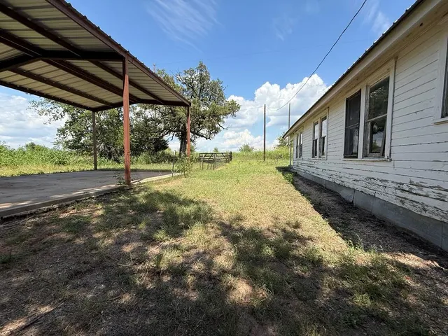a house view with a outdoor space