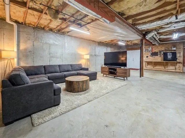 a living room with a couch and a table