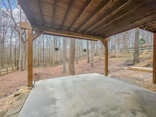 a outdoor living space with furniture and a potted plant