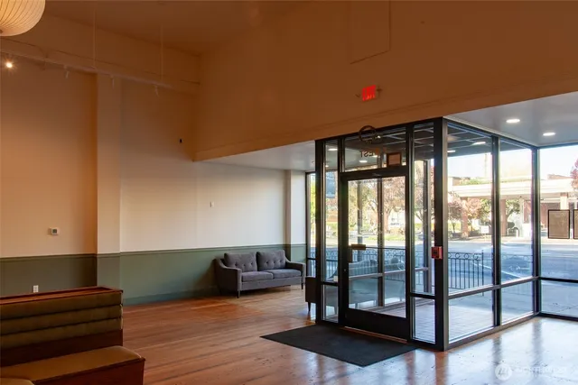 a open kitchen with stainless steel appliances granite countertop a sink and a stove