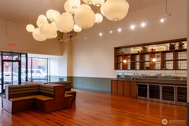 a room with furniture and wooden floor