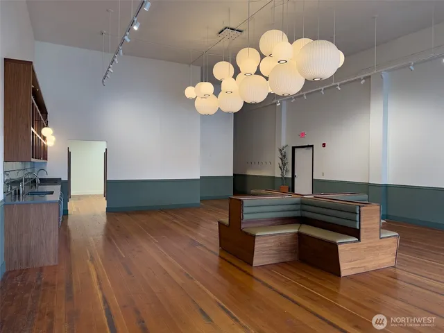 a room with furniture and wooden floor