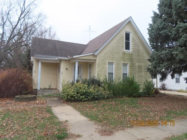 103 1st Street Bradford, IL 61421 - Photo 1 of 48 a front view of a house with garden