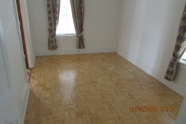 103 1st Street Bradford, IL 61421 - Photo 19 of 48 an empty room with windows