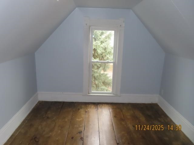 103 1st Street Bradford, IL 61421 - Photo 23 of 48 an empty room with wooden floor and windows