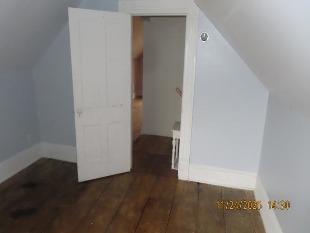 103 1st Street Bradford, IL 61421 - Photo 24 of 48 an empty room with wooden floor and closet