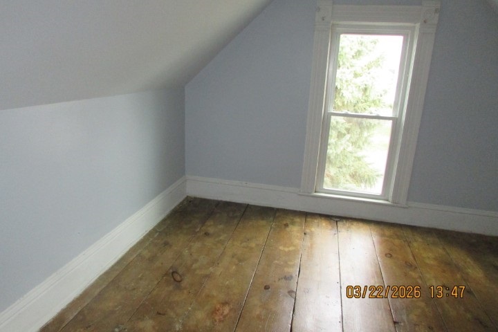 103 1st Street Bradford, IL 61421 - Photo 25 of 48 an empty room with a window