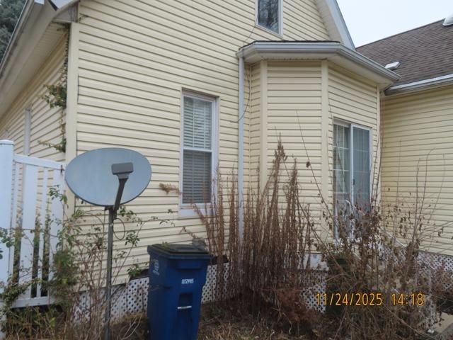 103 1st Street Bradford, IL 61421 - Photo 35 of 48 a front view of a house with a fountain