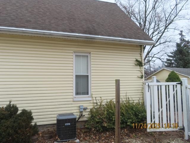 103 1st Street Bradford, IL 61421 - Photo 36 of 48 a view of a house with a yard and potted plants