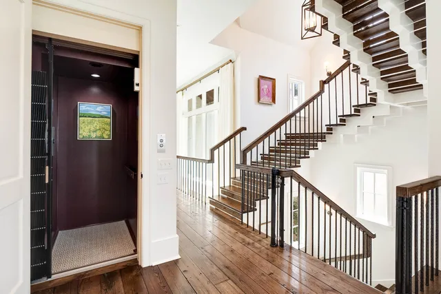 a spacious bedroom with a bed and a couch