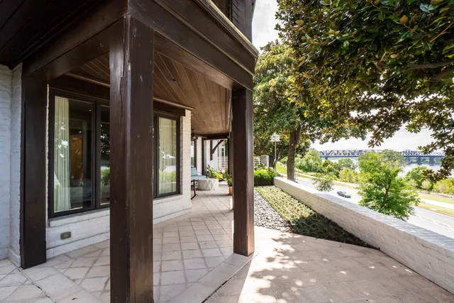 a view of a house with a potted plant