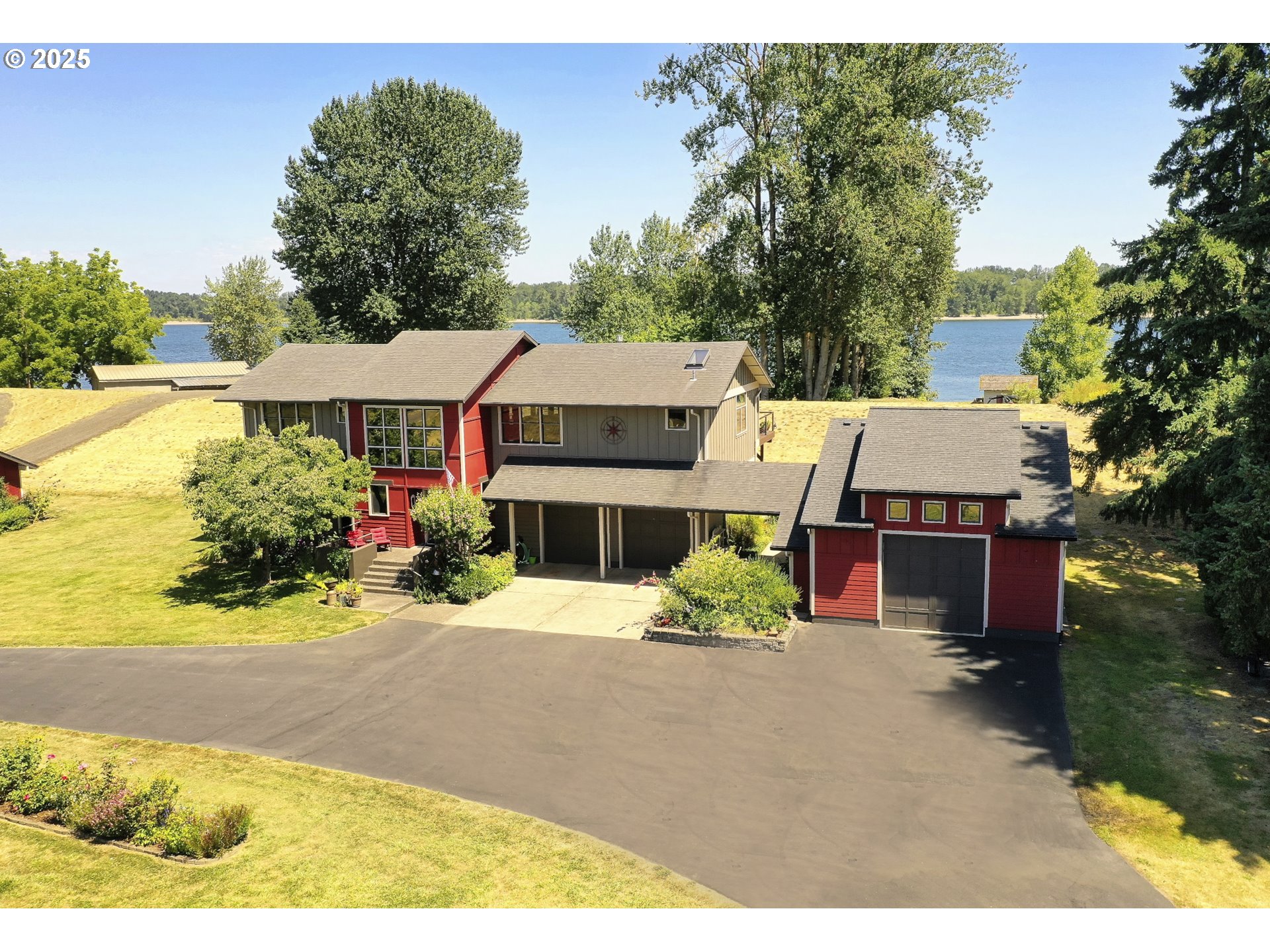 22732 Northwest Gillihan Road Portland, OR 97231 - Photo 1 of 48 a aerial view of a house