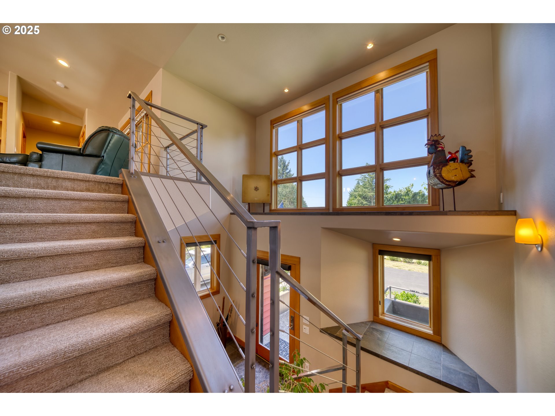 22732 Northwest Gillihan Road Portland, OR 97231 - Photo 12 of 48 a view of entryway and hall with wooden floor