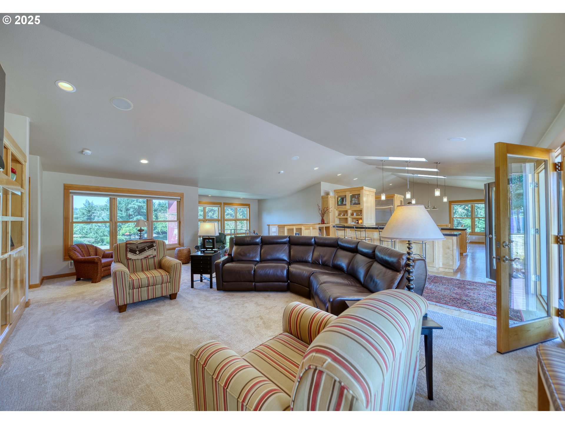 22732 Northwest Gillihan Road Portland, OR 97231 - Photo 14 of 48 a living room with furniture and wooden floor