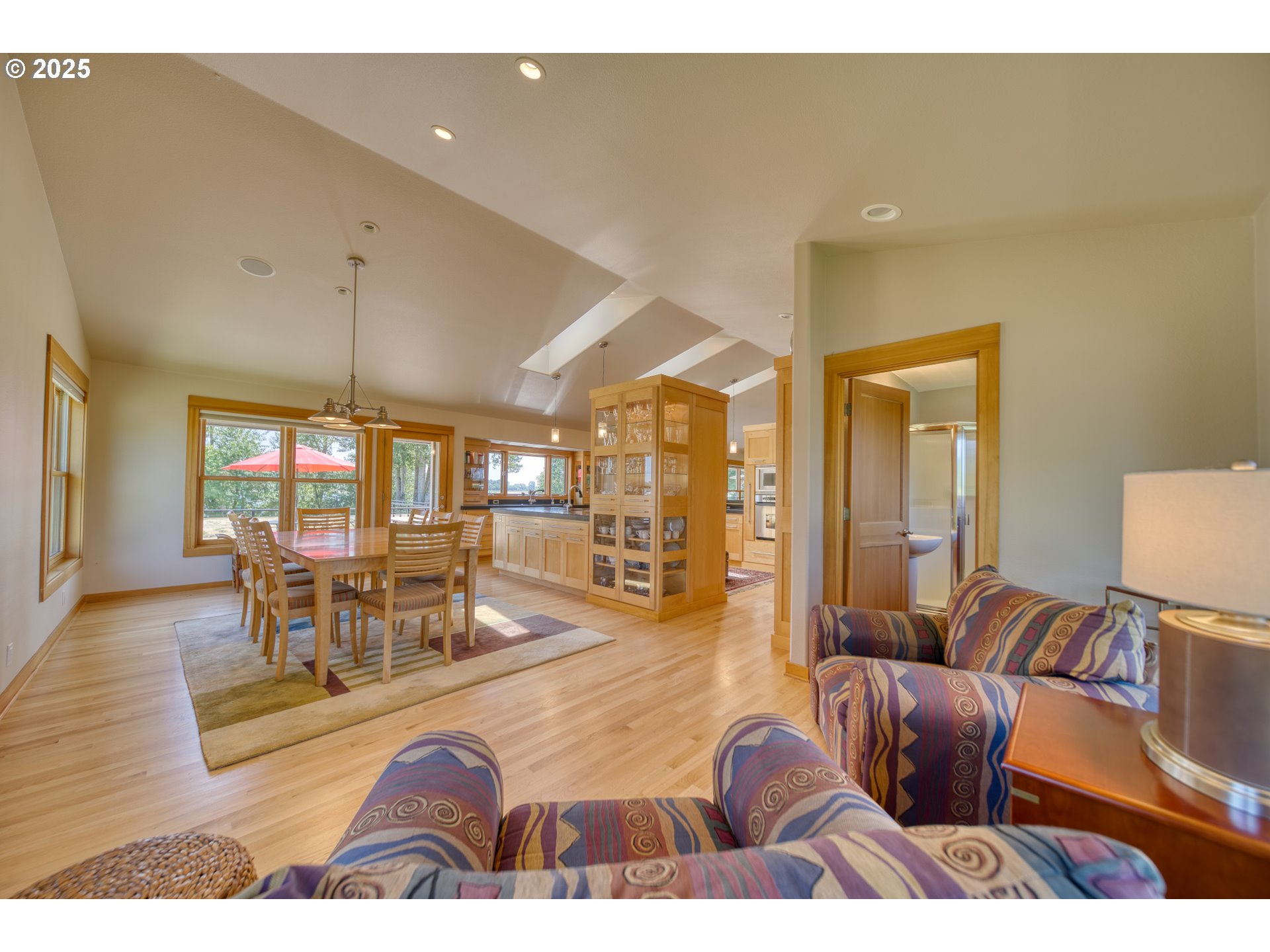 22732 Northwest Gillihan Road Portland, OR 97231 - Photo 18 of 48 a living room with furniture and a large window