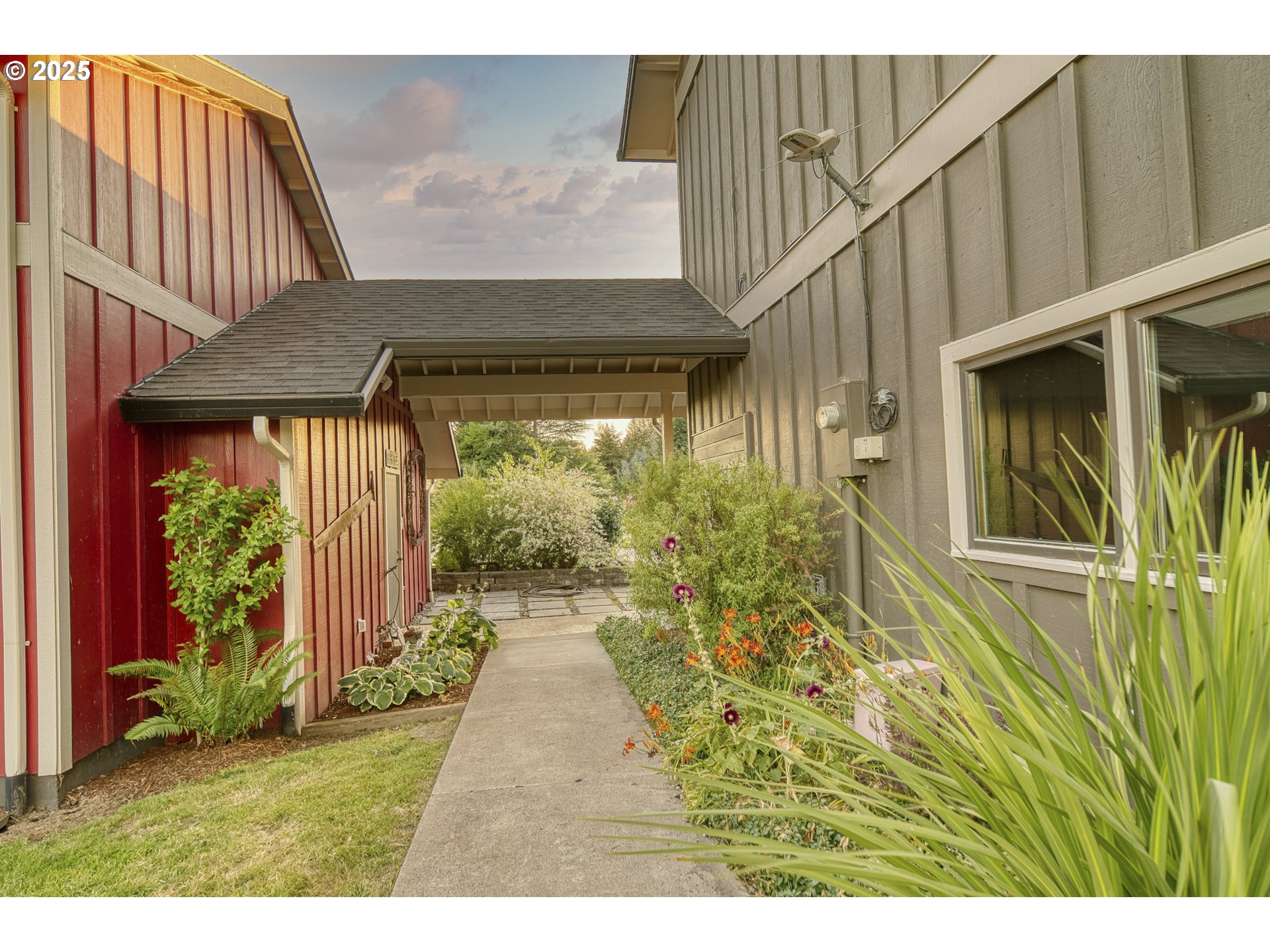 22732 Northwest Gillihan Road Portland, OR 97231 - Photo 27 of 48 a view of a backyard with pathway