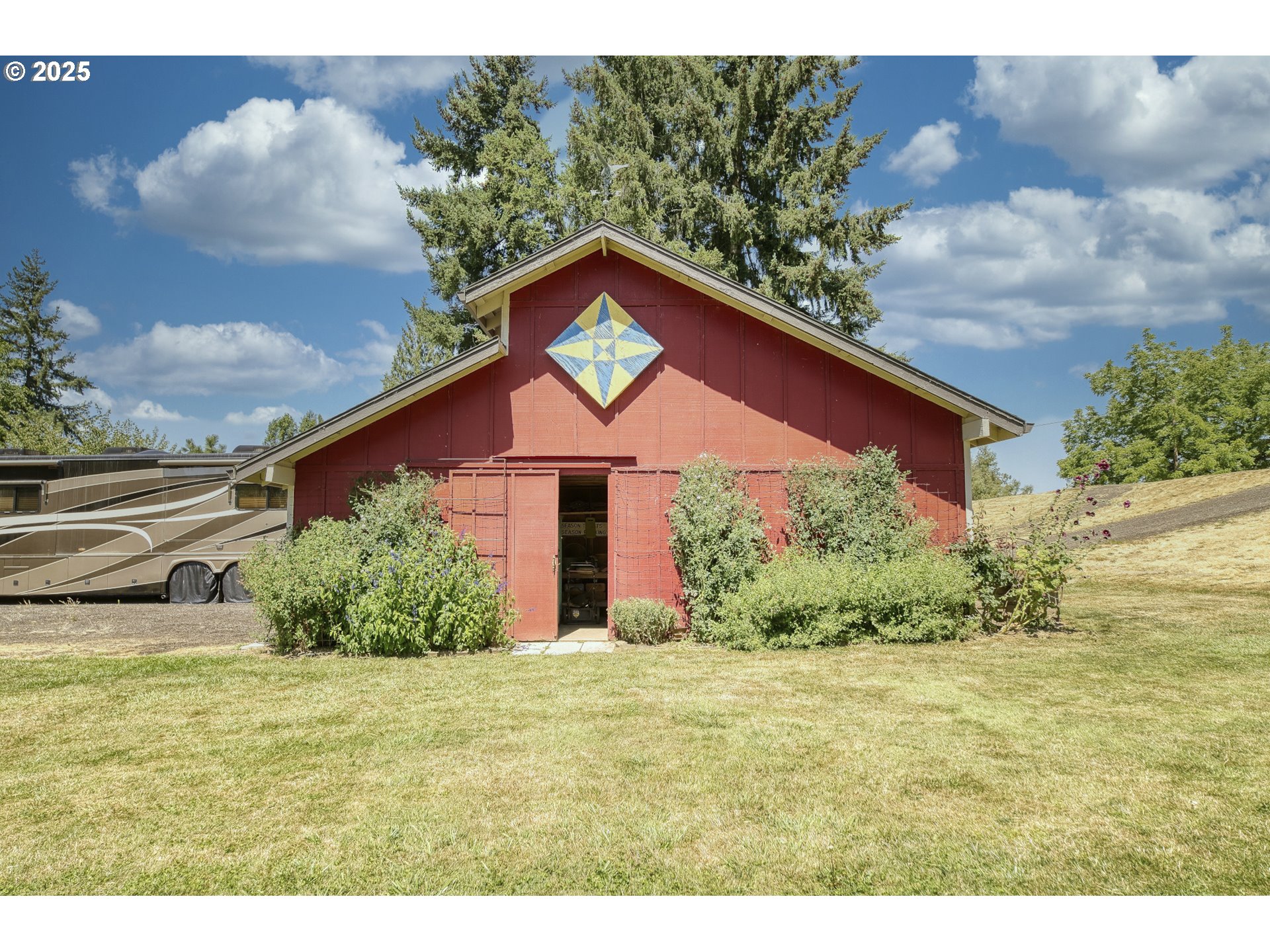 22732 Northwest Gillihan Road Portland, OR 97231 - Photo 29 of 48 a front view of a house with a yard