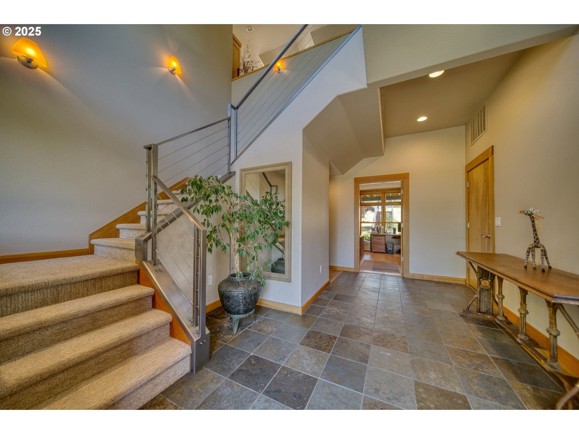 22732 Northwest Gillihan Road Portland, OR 97231 - Photo 3 of 48 a view of entryway and hall with wooden floor