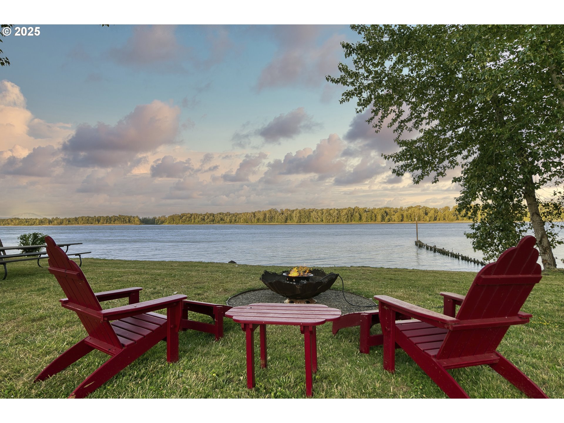 22732 Northwest Gillihan Road Portland, OR 97231 - Photo 38 of 48 a view of a lake with outdoor seating