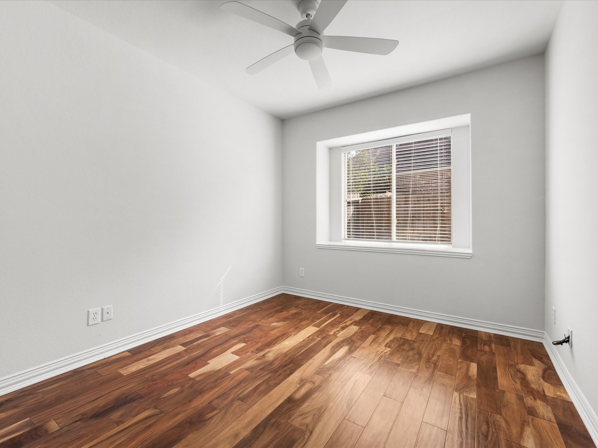 323 Arbor Ridge Lane Conroe, TX 77384 - Photo 25 of 40 Fresh, bright, and ready for whatever you need it to be. Wood floors, big window, ceiling fan. Bedroom, nursery, guest room, gym. The blank canvas is the point.