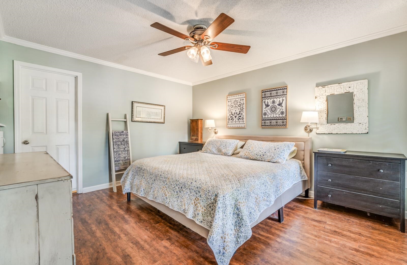 453 Fleda Road Memphis, TN 38120 - Photo 17 of 31 a bedroom with a bed and a dresser