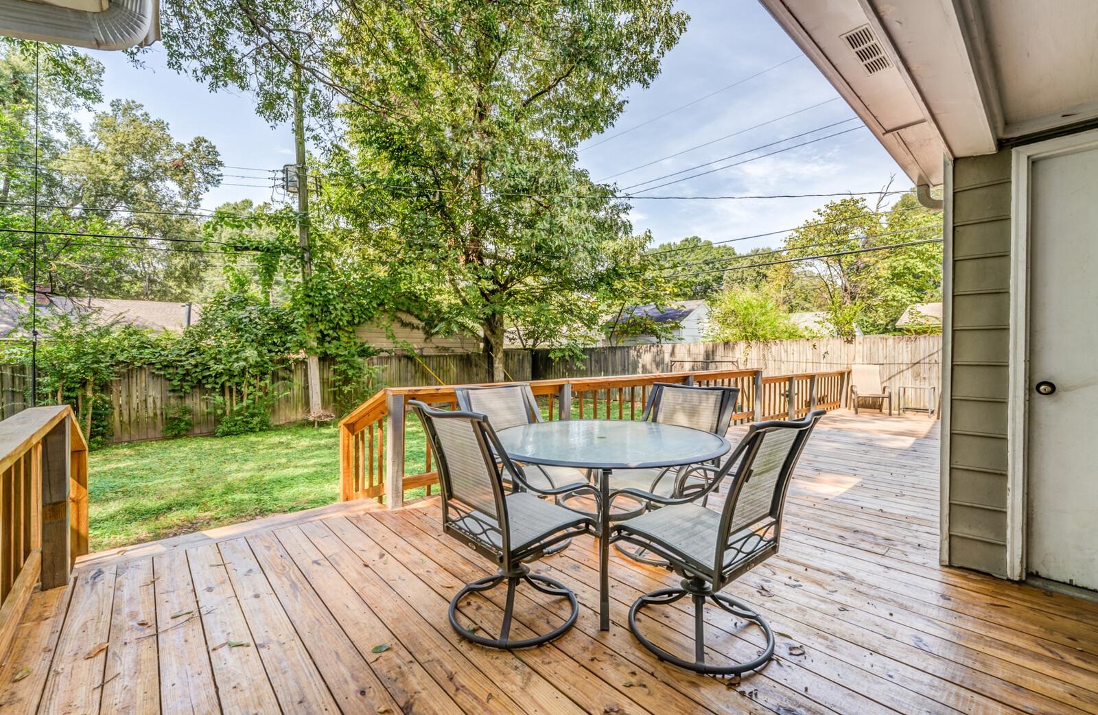 453 Fleda Road Memphis, TN 38120 - Photo 27 of 31 a view of a deck with furniture and a yard