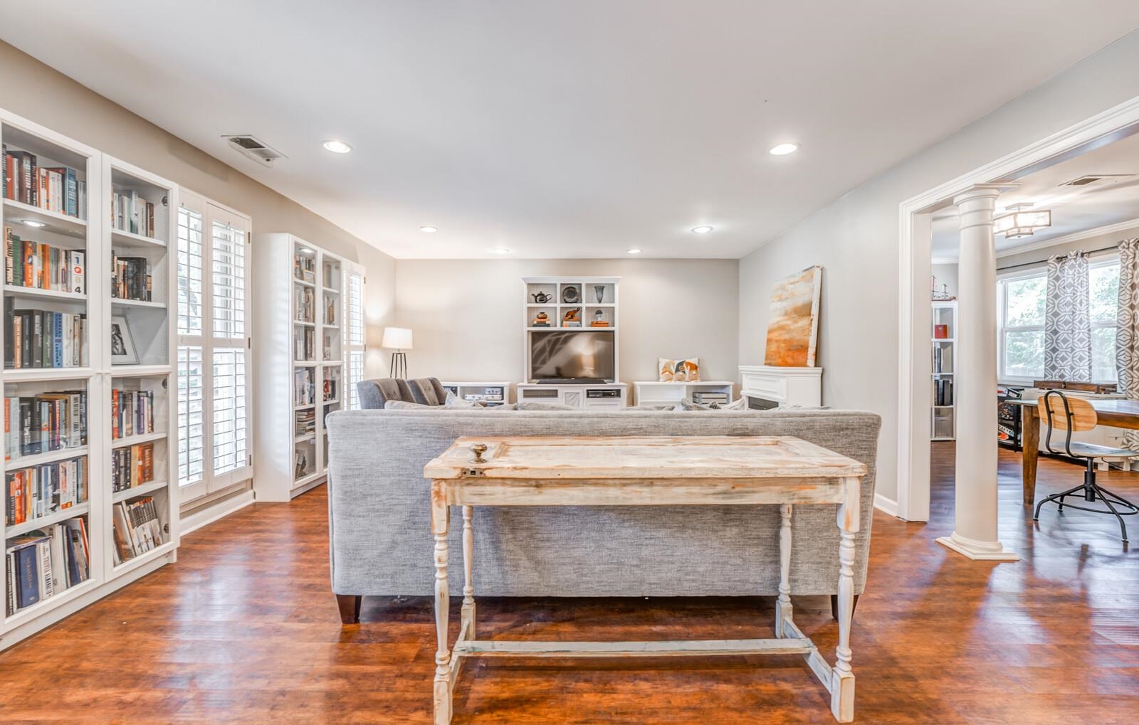 453 Fleda Road Memphis, TN 38120 - Photo 6 of 31 a view of a dining room kitchen with furniture and wooden floor