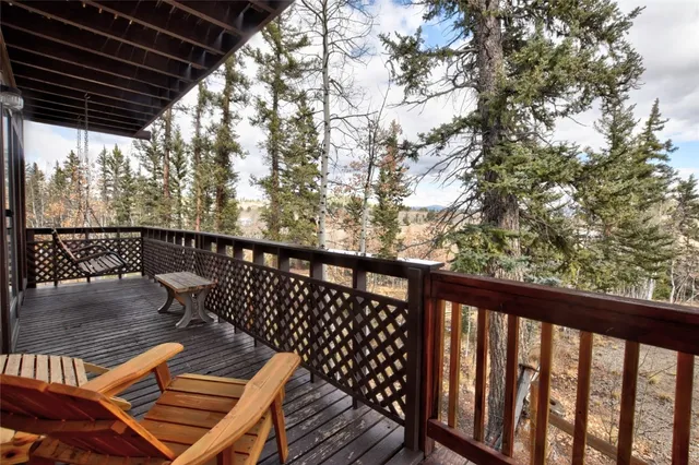 a view of balcony with furniture