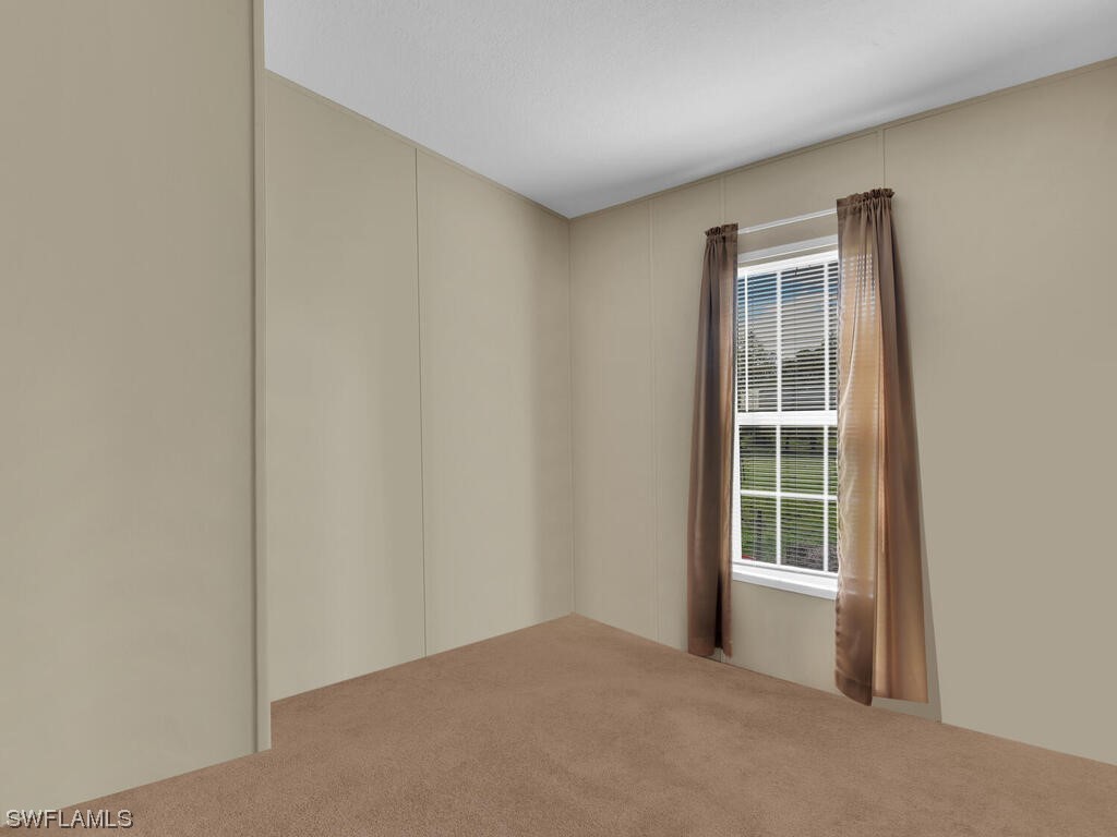 1183 Summerall Road LaBelle, FL 33935 - Photo 19 of 28 a view of empty room with windows