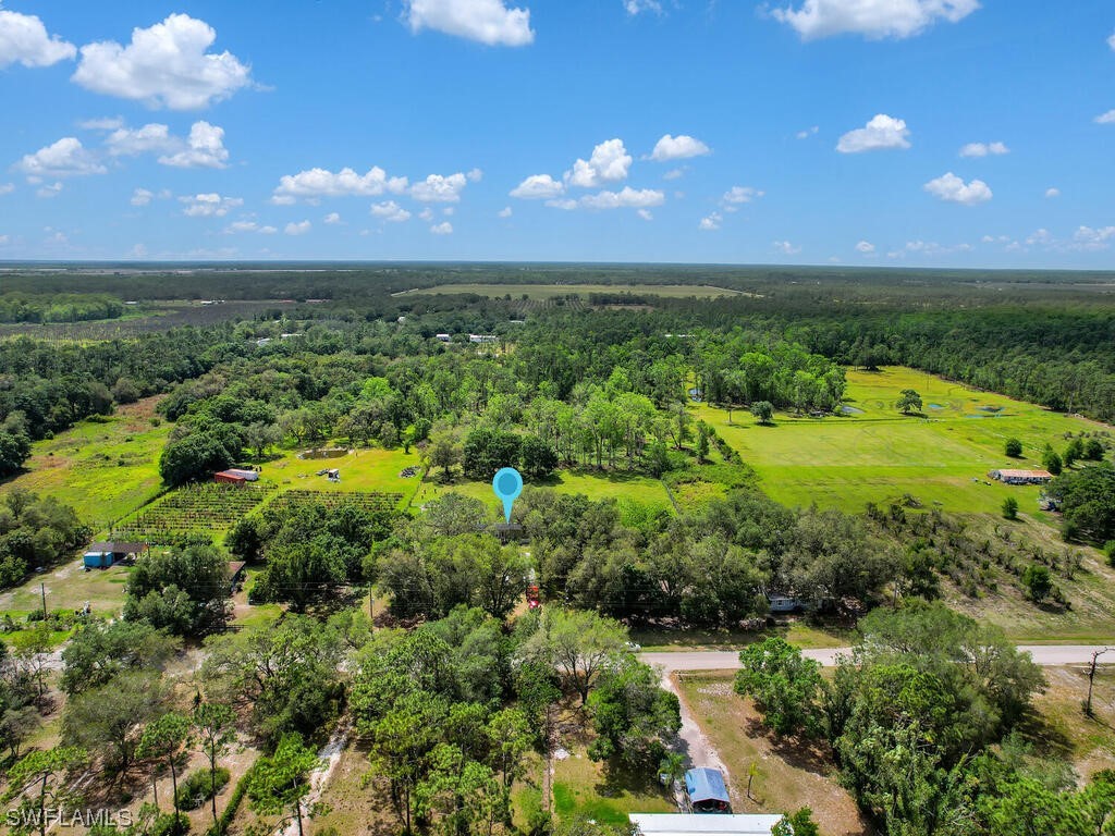 1183 Summerall Road LaBelle, FL 33935 - Photo 27 of 28 a view of a bunch of trees and a yard
