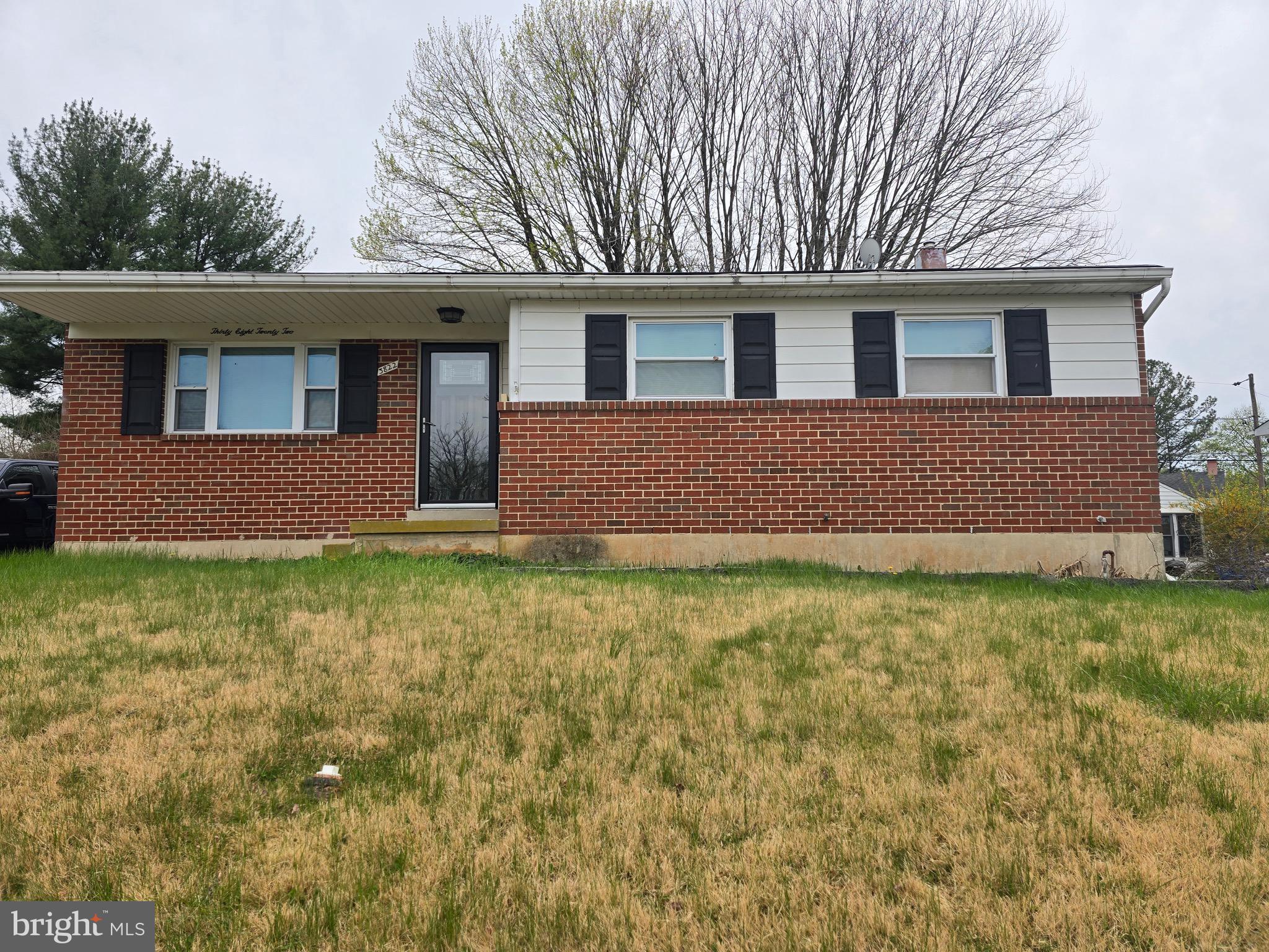 3822 Cassandra Road Randallstown, MD 21133 - Photo 1 of 24 a front view of a house with garden