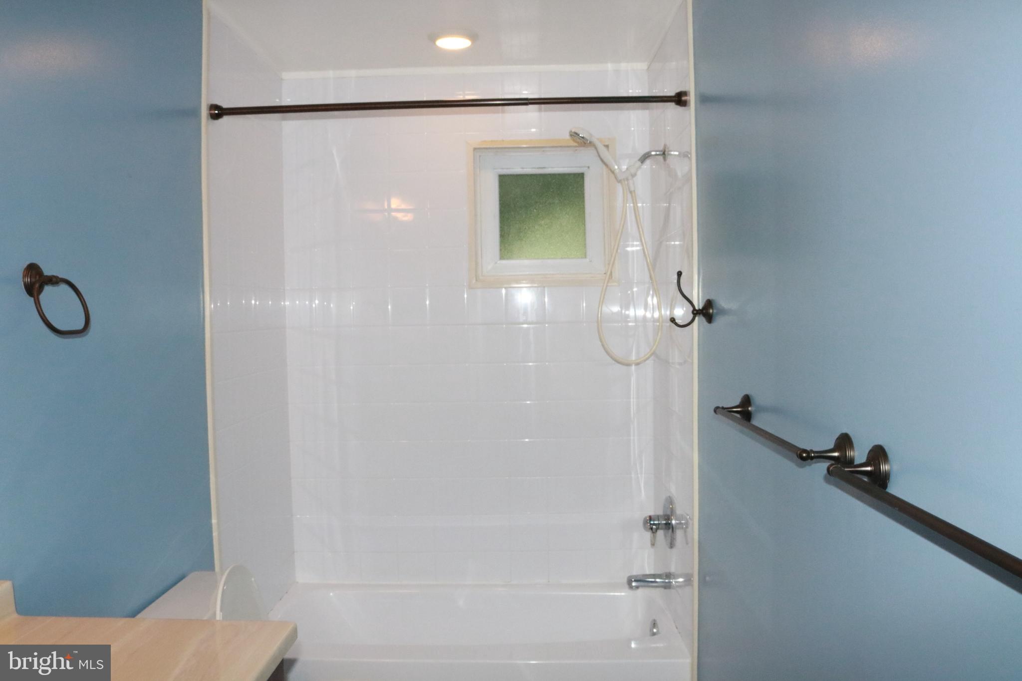 3822 Cassandra Road Randallstown, MD 21133 - Photo 18 of 24 a bathroom with a shower