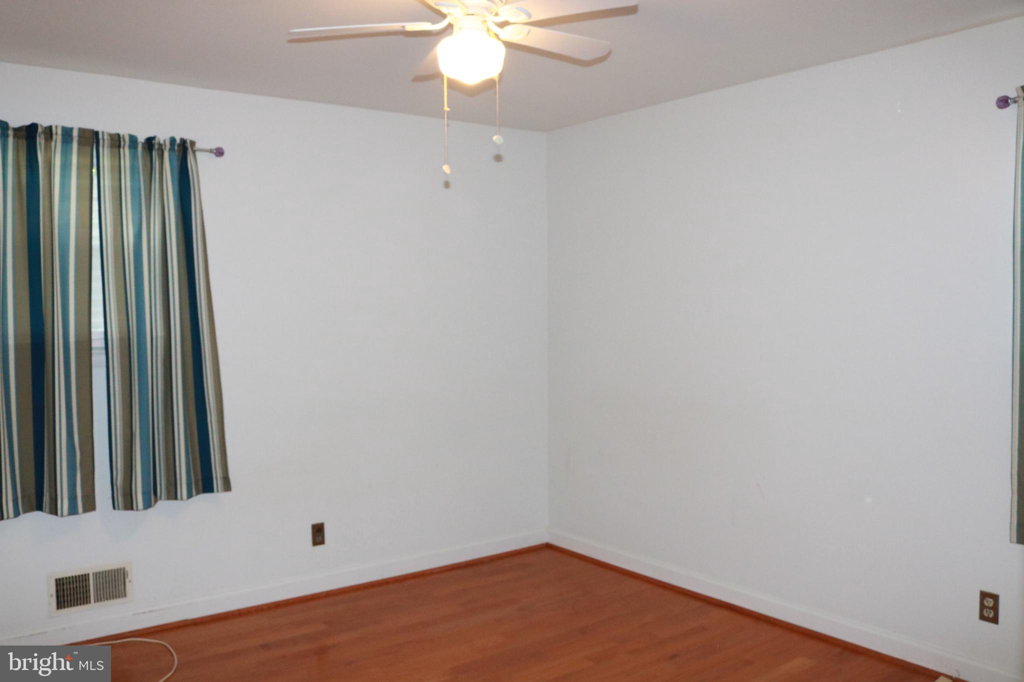 3822 Cassandra Road Randallstown, MD 21133 - Photo 20 of 24 an empty room with a window