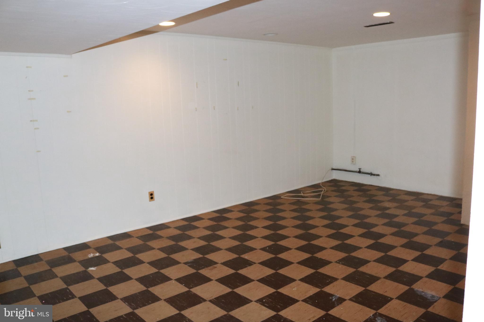 3822 Cassandra Road Randallstown, MD 21133 - Photo 5 of 24 a view of a black and white wall