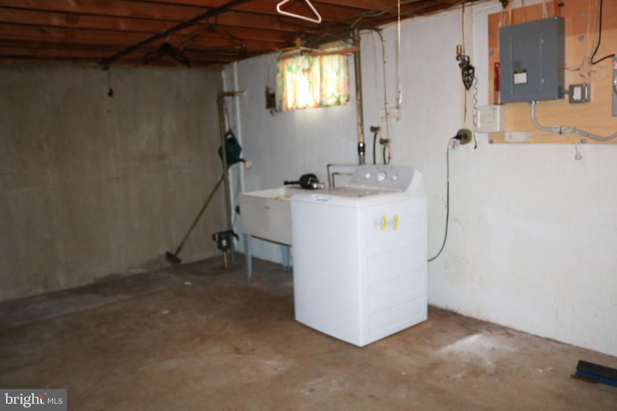 3822 Cassandra Road Randallstown, MD 21133 - Photo 9 of 24 a utility room with dryer and washer