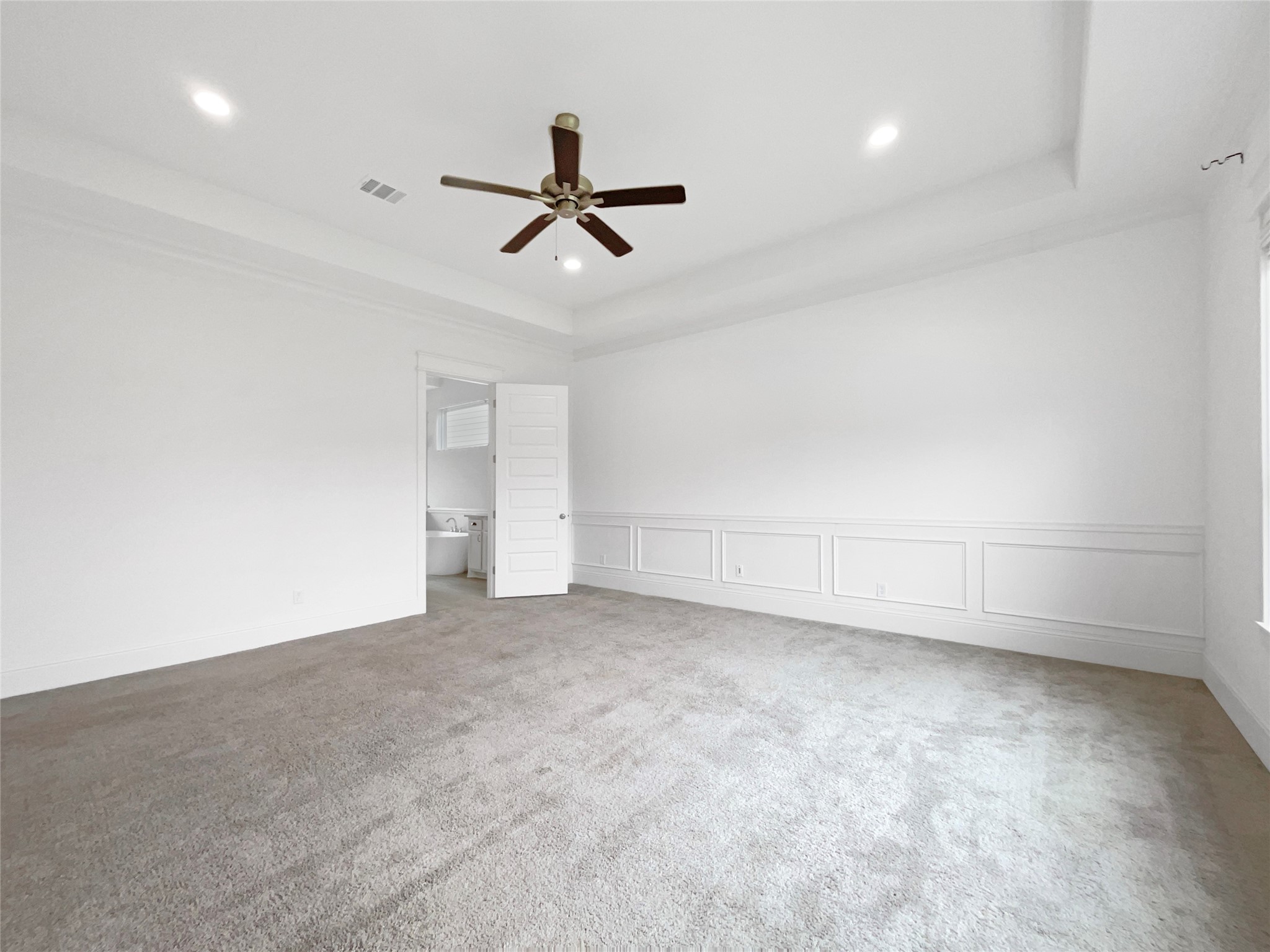 2333 Goldenglade Drive Conroe, TX 77384 - Photo 12 of 21 a view of a livingroom with a ceiling fan and window