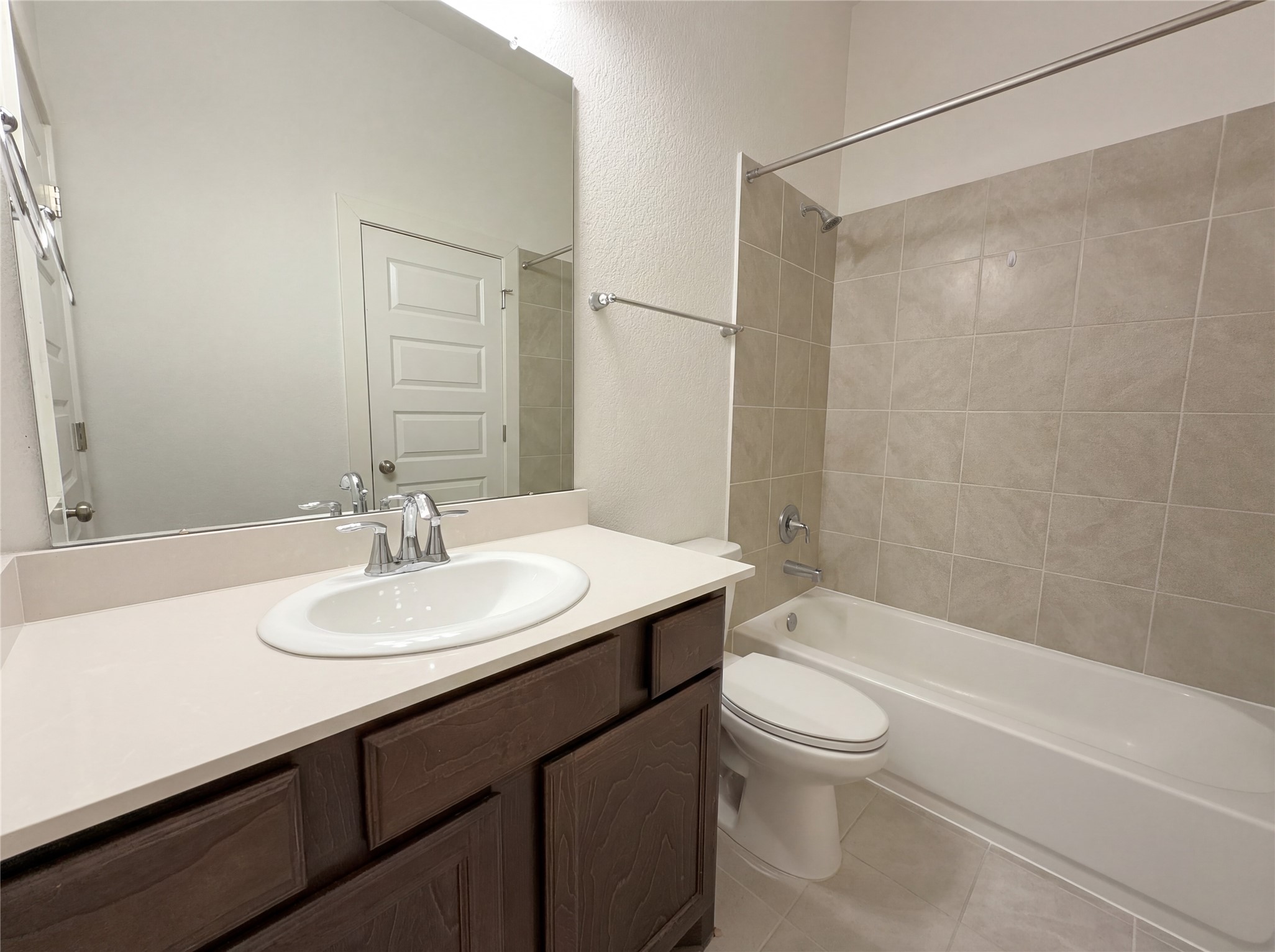 2333 Goldenglade Drive Conroe, TX 77384 - Photo 20 of 21 a bathroom with a sink a toilet and shower