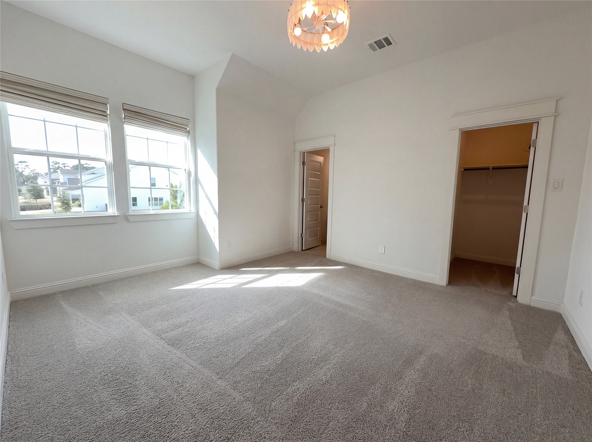 2333 Goldenglade Drive Conroe, TX 77384 - Photo 4 of 21 an empty room with windows and entrance