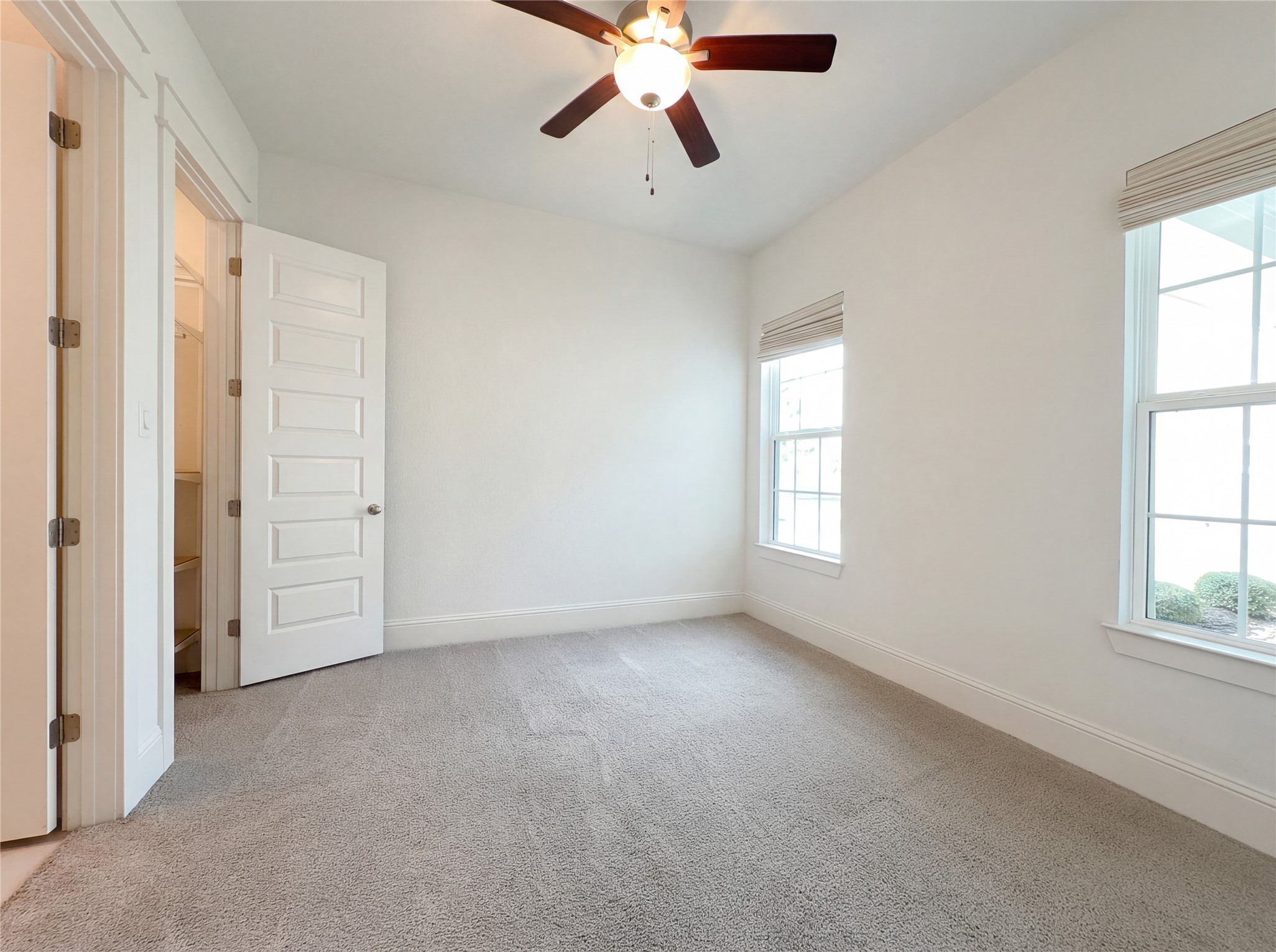 2333 Goldenglade Drive Conroe, TX 77384 - Photo 6 of 21 a view of an empty room with a window