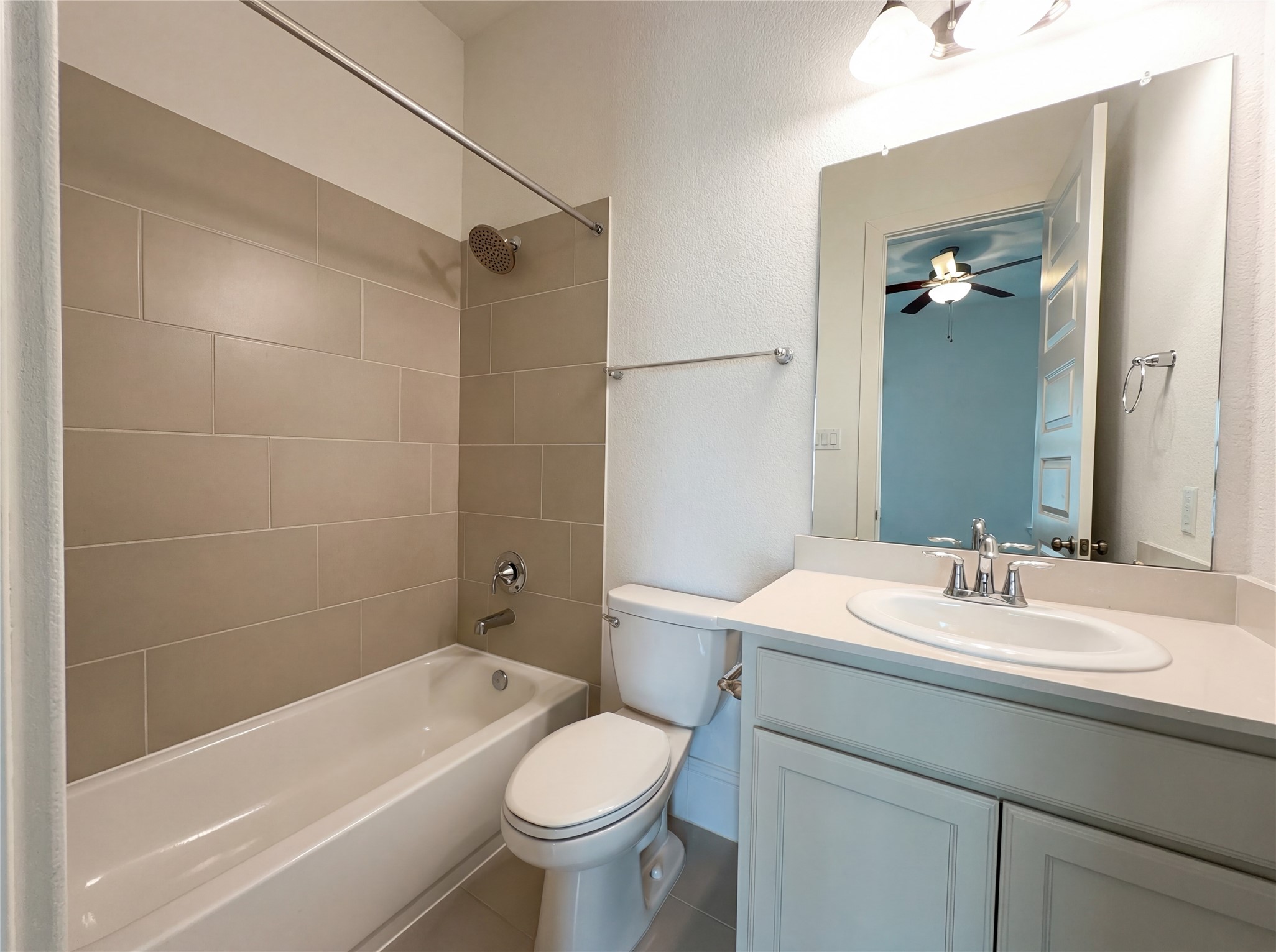 2333 Goldenglade Drive Conroe, TX 77384 - Photo 7 of 21 a bathroom with a sink toilet and shower