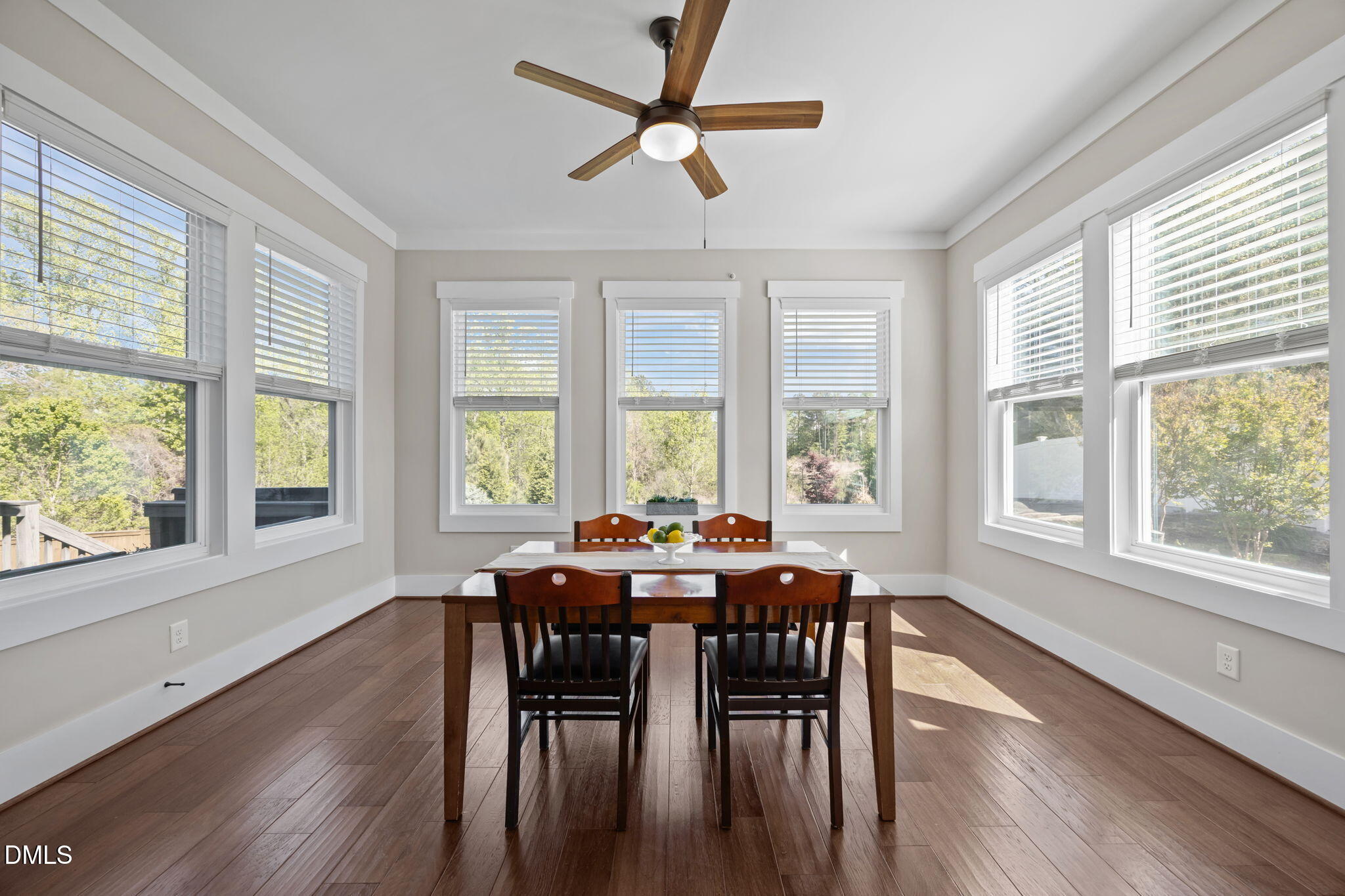 1324 Spicer Lane Rolesville, NC 27571 - Photo 13 of 59 a view of a dining room with furniture window and wooden floor