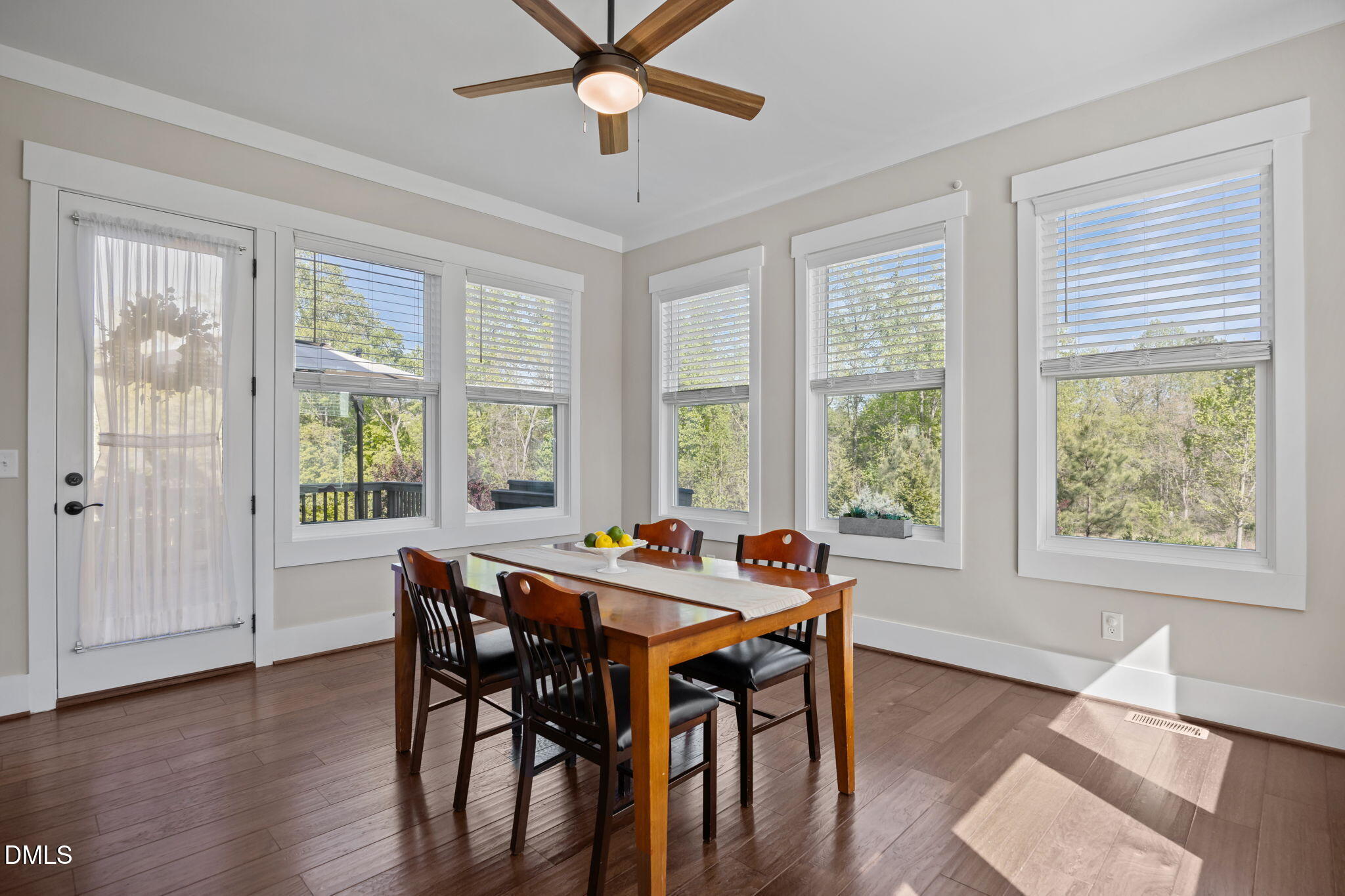 1324 Spicer Lane Rolesville, NC 27571 - Photo 14 of 59 a view of a dining room with furniture window and wooden floor