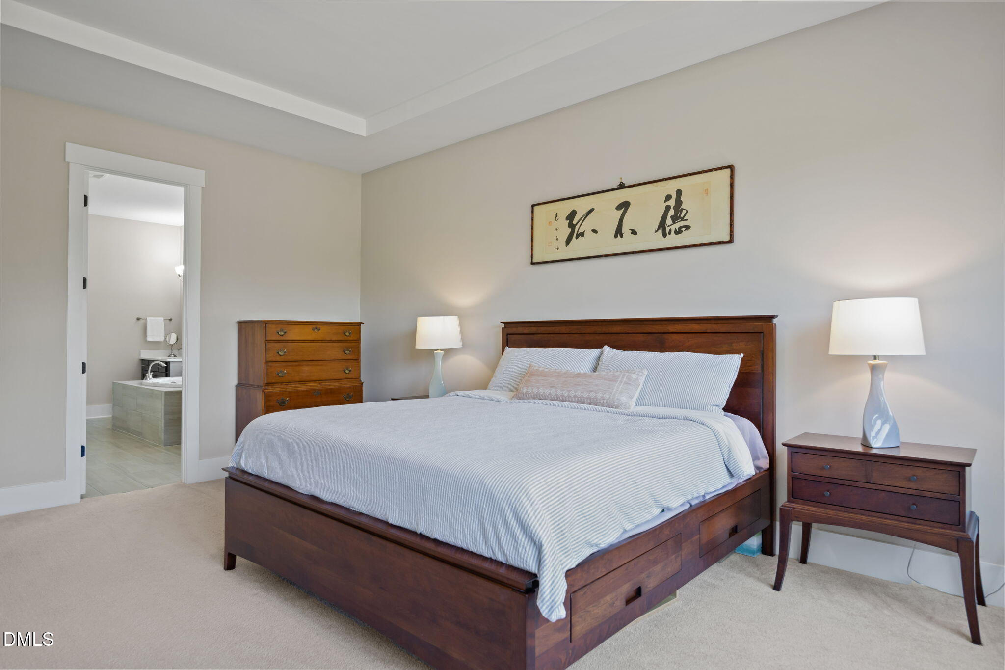 1324 Spicer Lane Rolesville, NC 27571 - Photo 19 of 59 a bedroom with a bed and a lamp on table