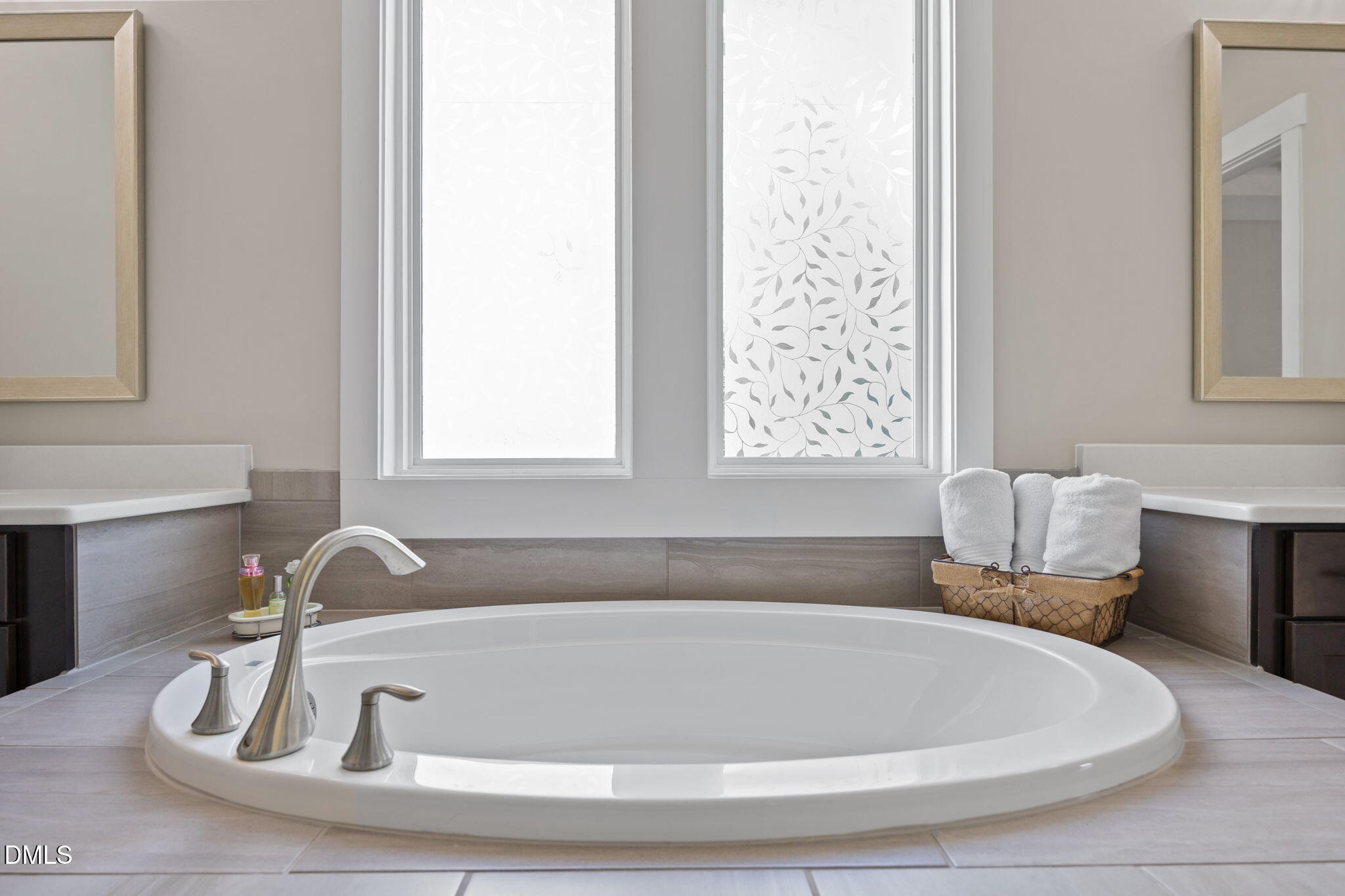 1324 Spicer Lane Rolesville, NC 27571 - Photo 21 of 59 a bathroom with bathtub and window