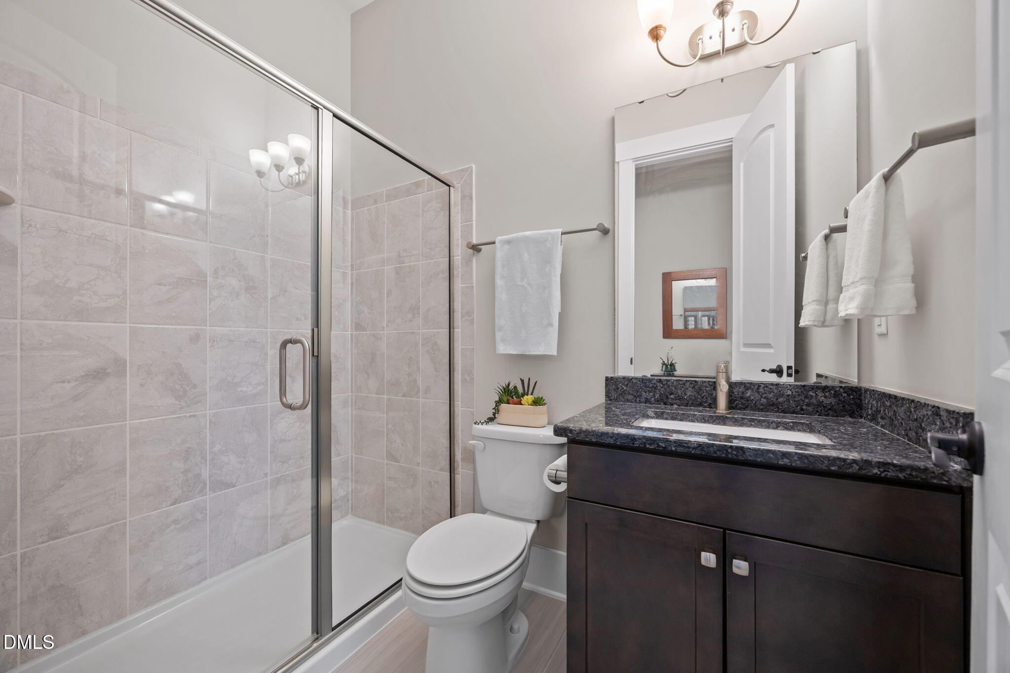 1324 Spicer Lane Rolesville, NC 27571 - Photo 25 of 59 a bathroom with a granite countertop sink toilet and shower