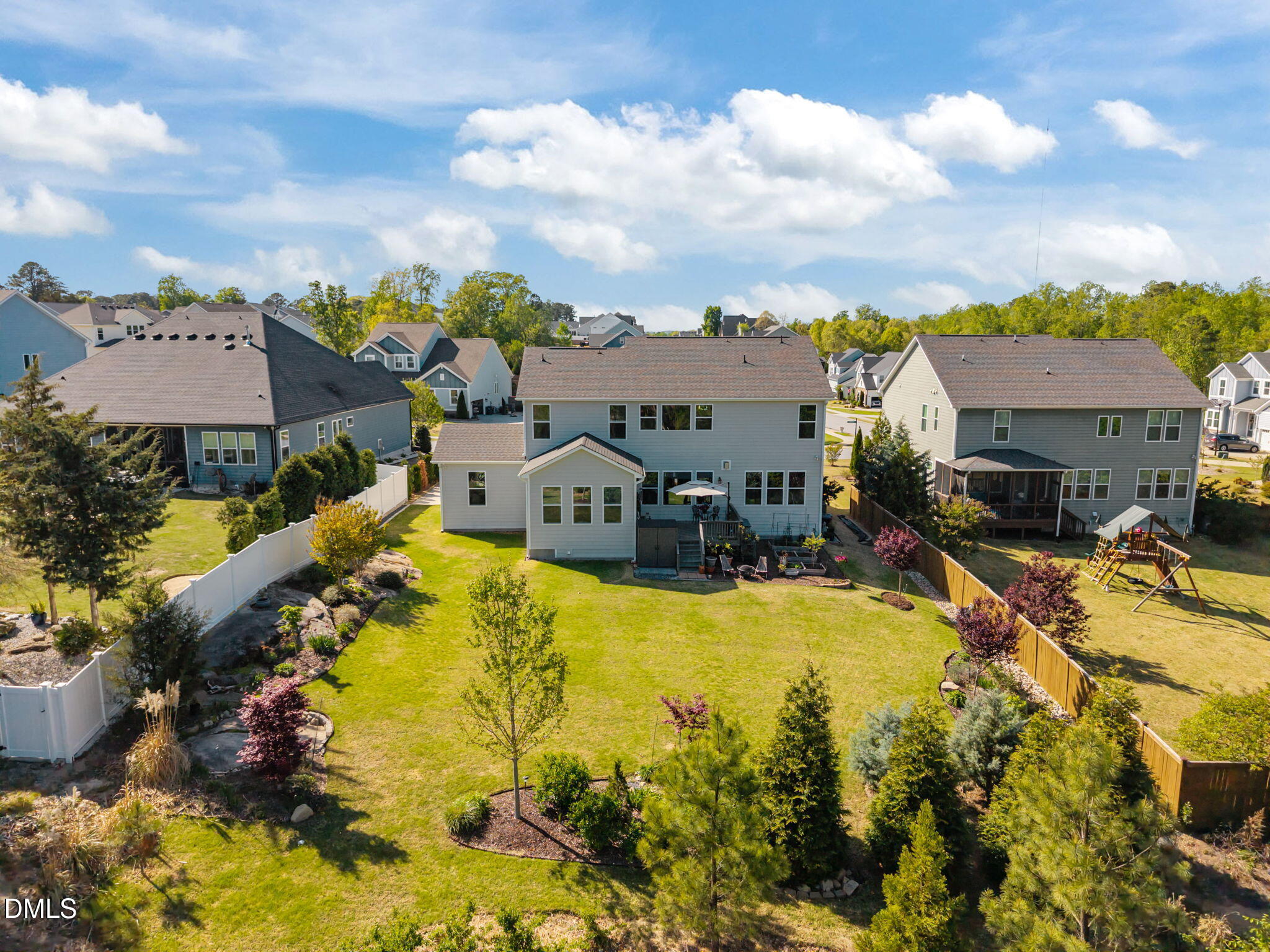 1324 Spicer Lane Rolesville, NC 27571 - Photo 2 of 59 a swimming pool with outdoor seating and yard