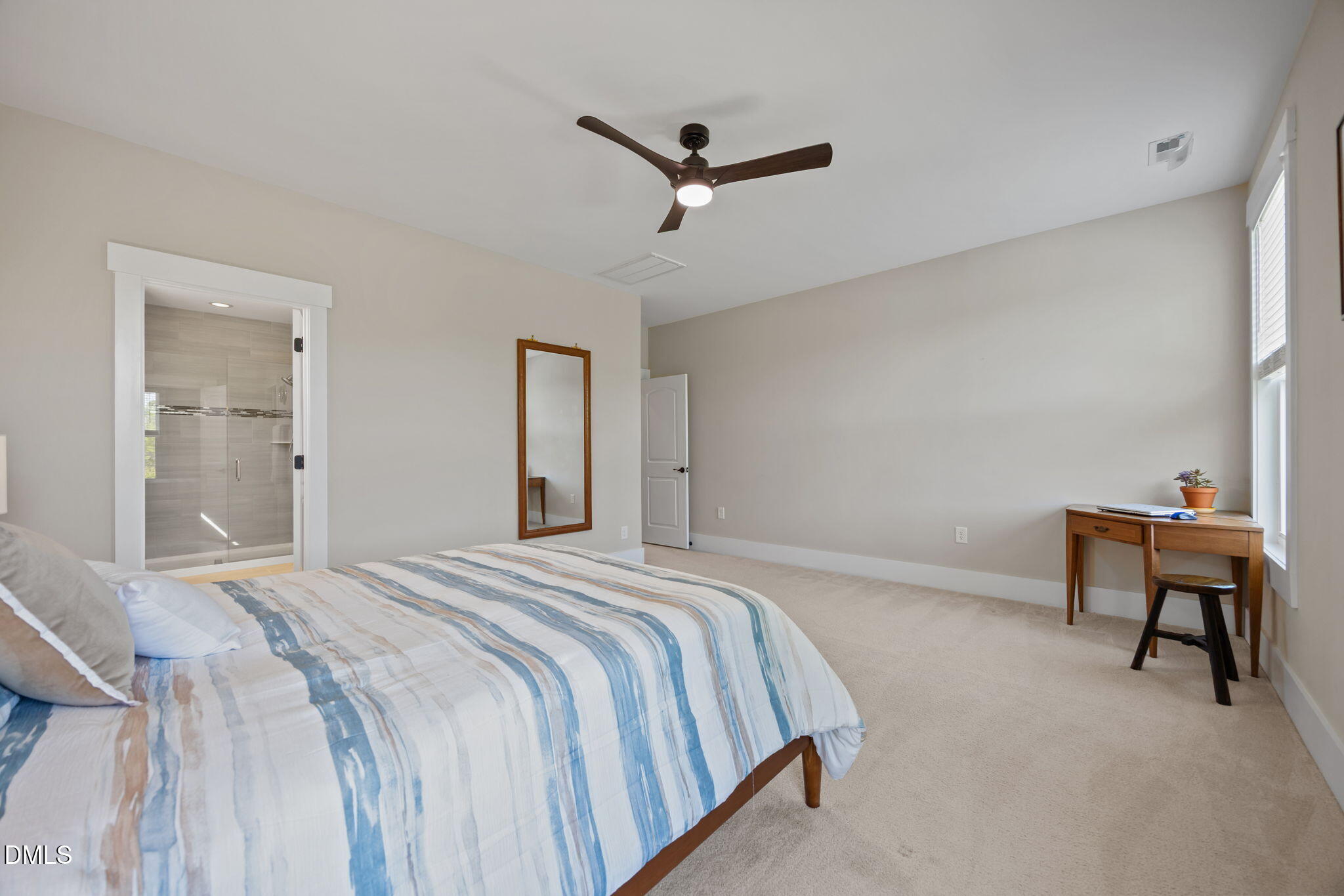 1324 Spicer Lane Rolesville, NC 27571 - Photo 31 of 59 a bedroom with a bed and a chair